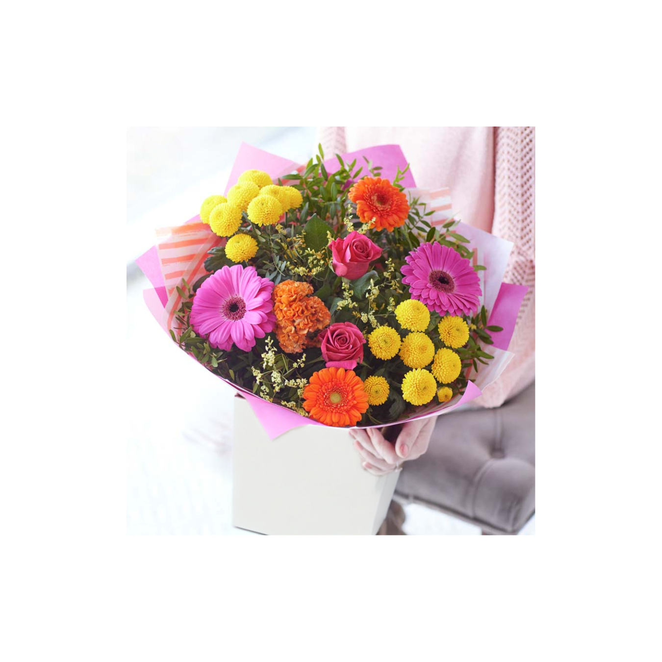 bright gift bouquet with roses and gerberas