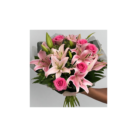 Roses and lillies delivered by online florist near me. Pink bouquet